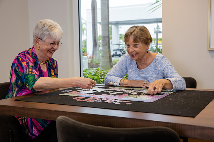 Residents enjoying our card and puzzle lounge.