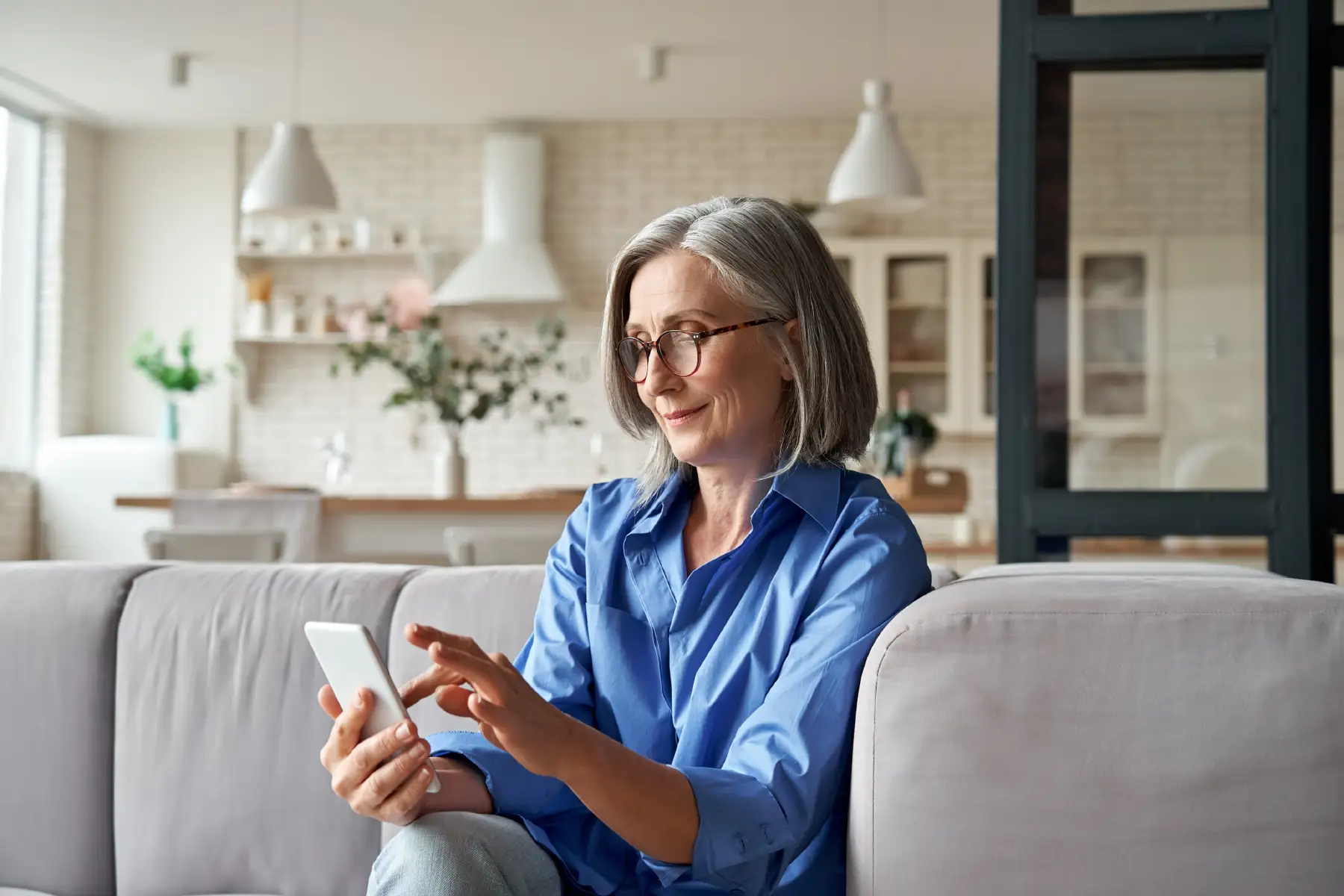 a senior woman using her smartphone