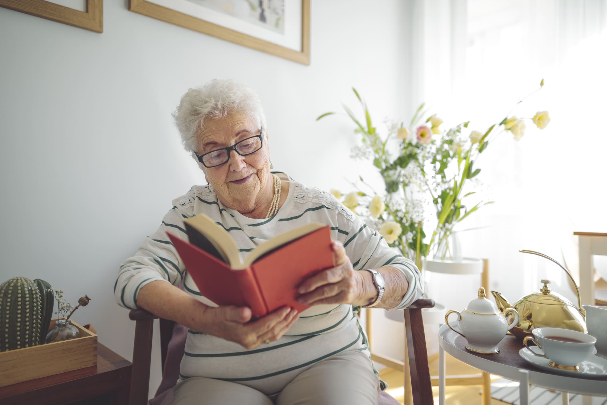 Senior woman reading book